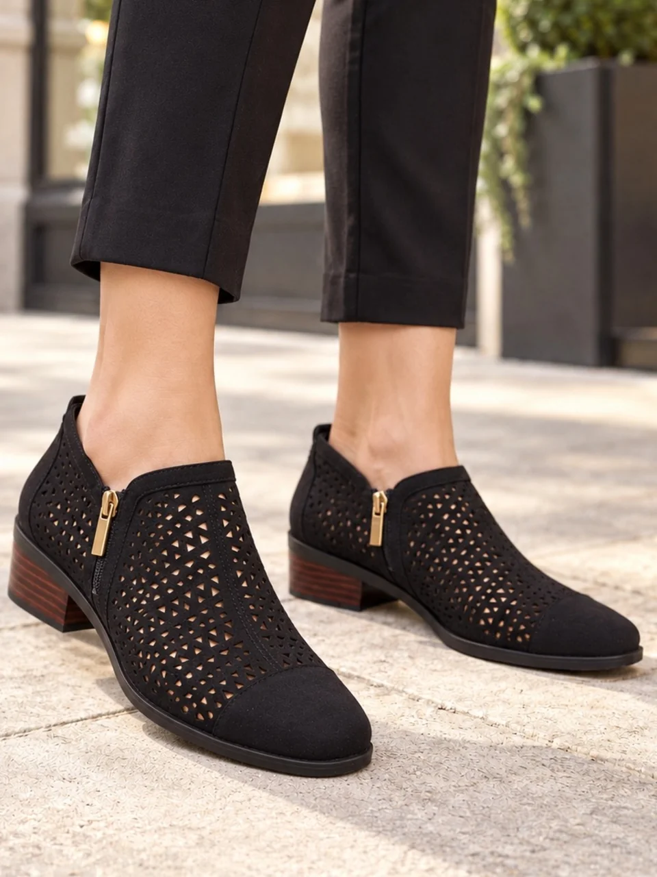 Bella Vita perforated zip ankle bootie Black Zip Ankle Booties US 9
